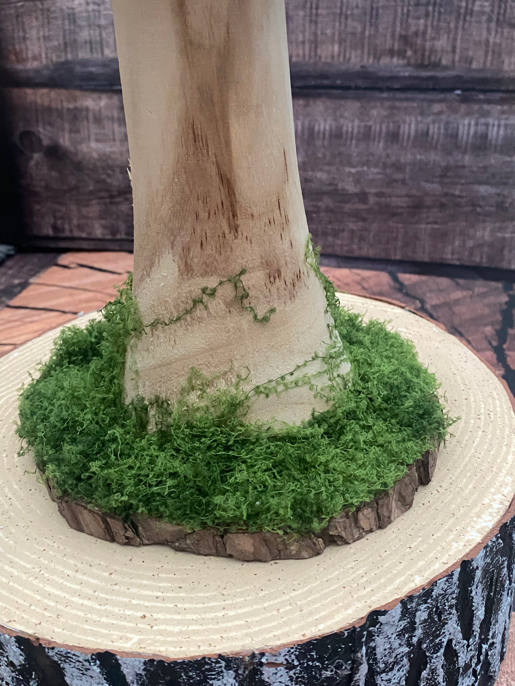 Tall wooden spotted mushroom