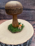 Natural wooden mushroom with squirrel