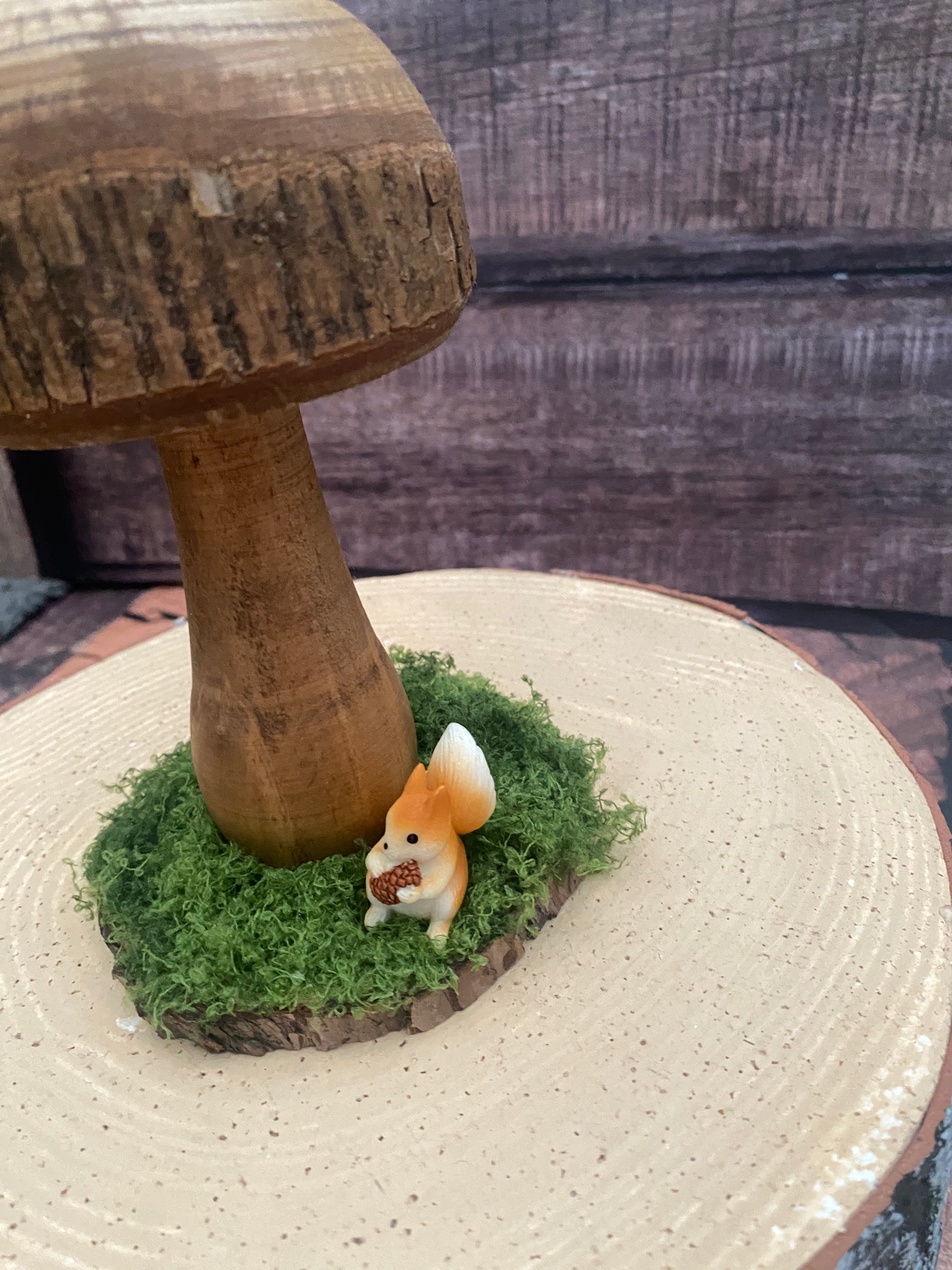 Natural wooden mushroom with squirrel