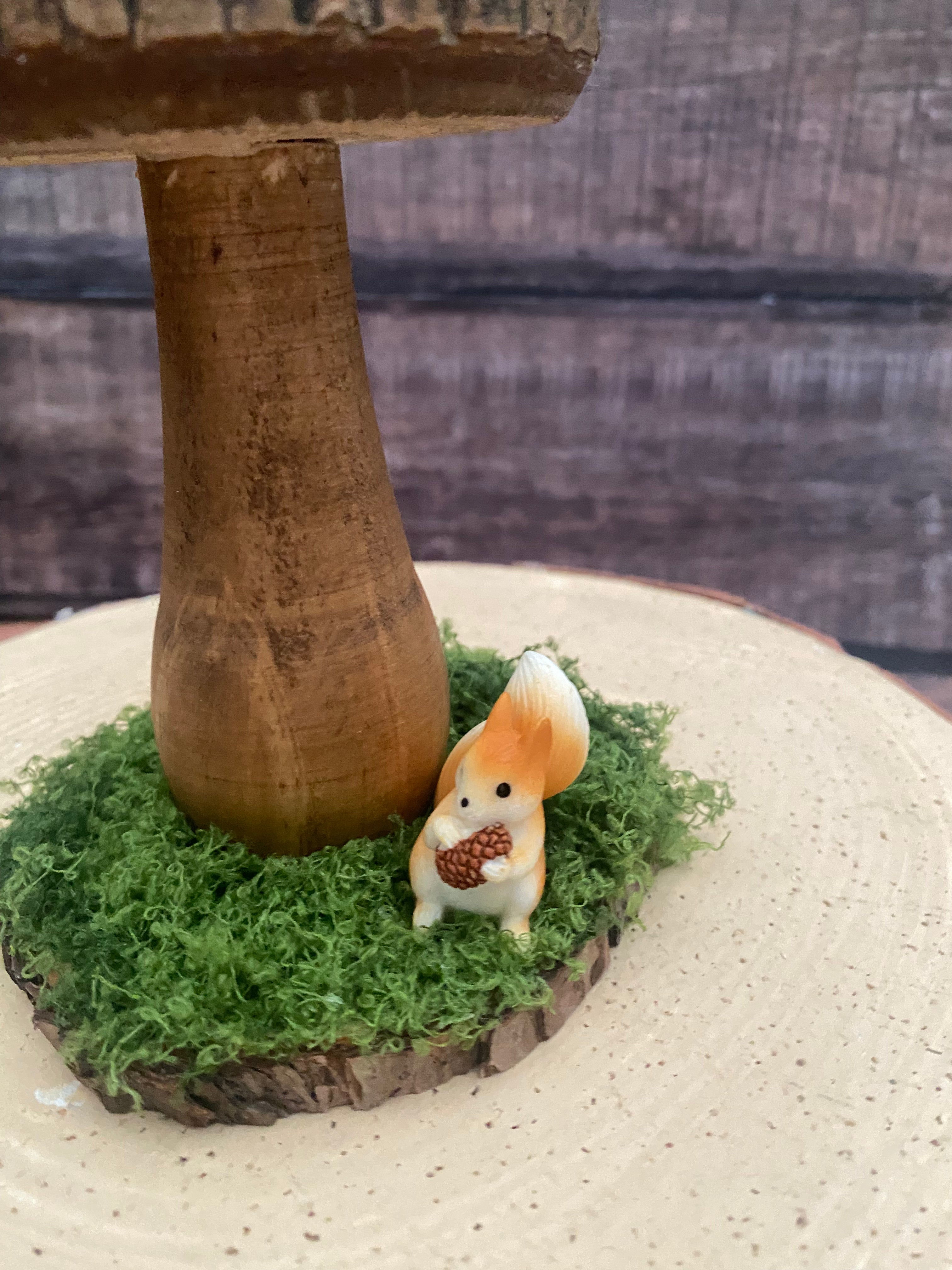 Natural wooden mushroom with squirrel