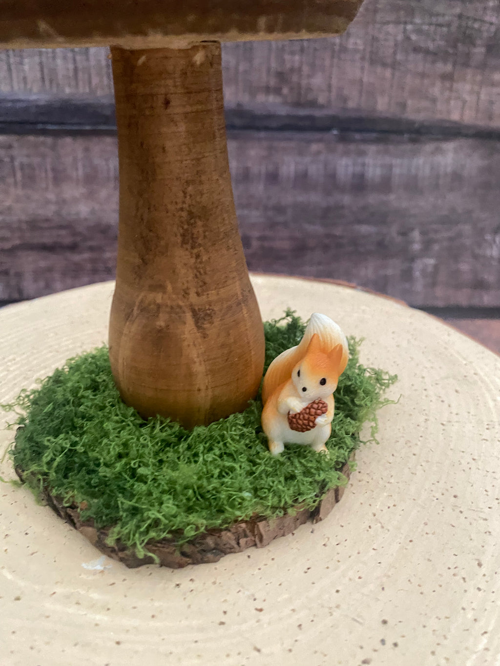 Natural wooden mushroom with squirrel
